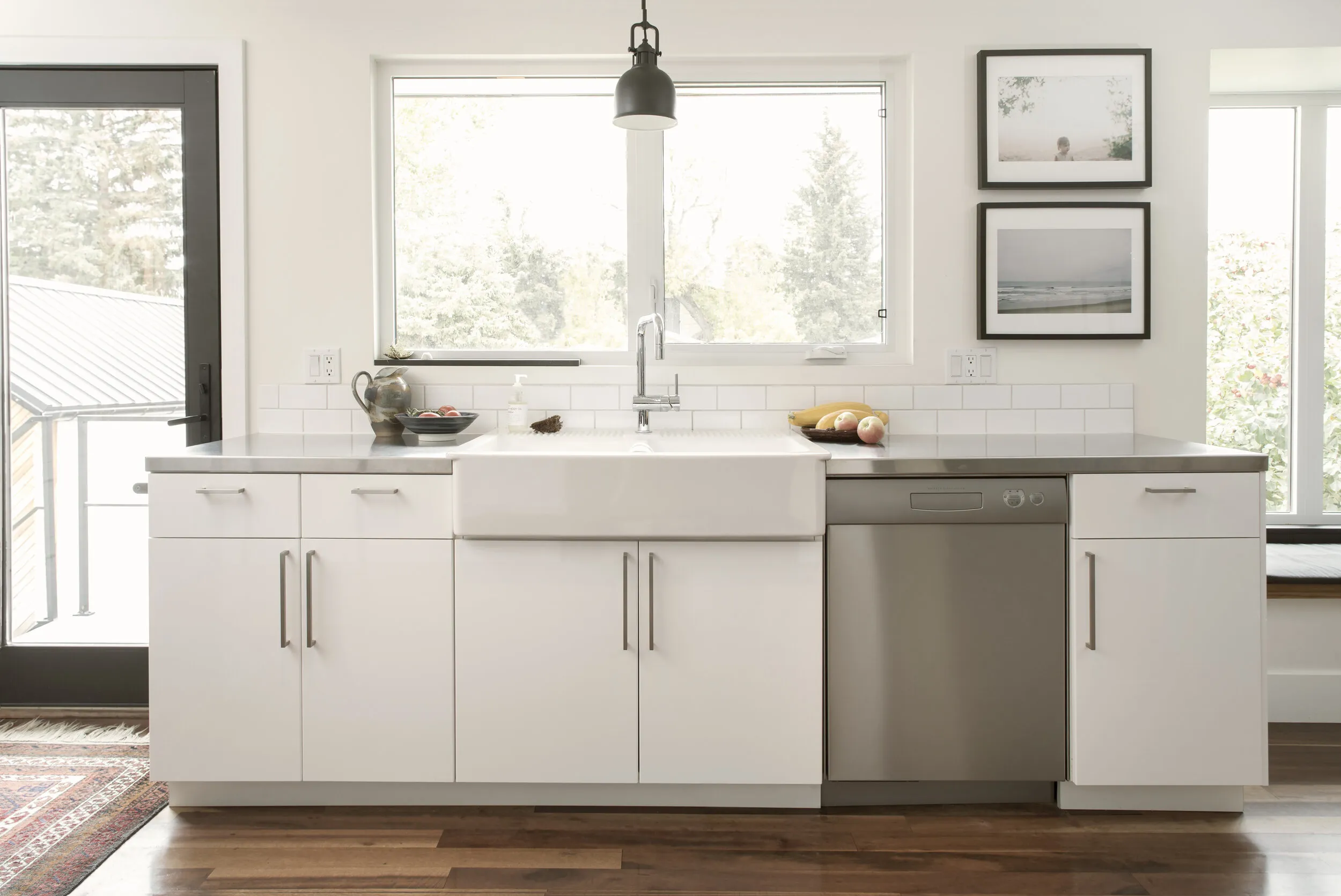 Renovated white kitchen by HW Group