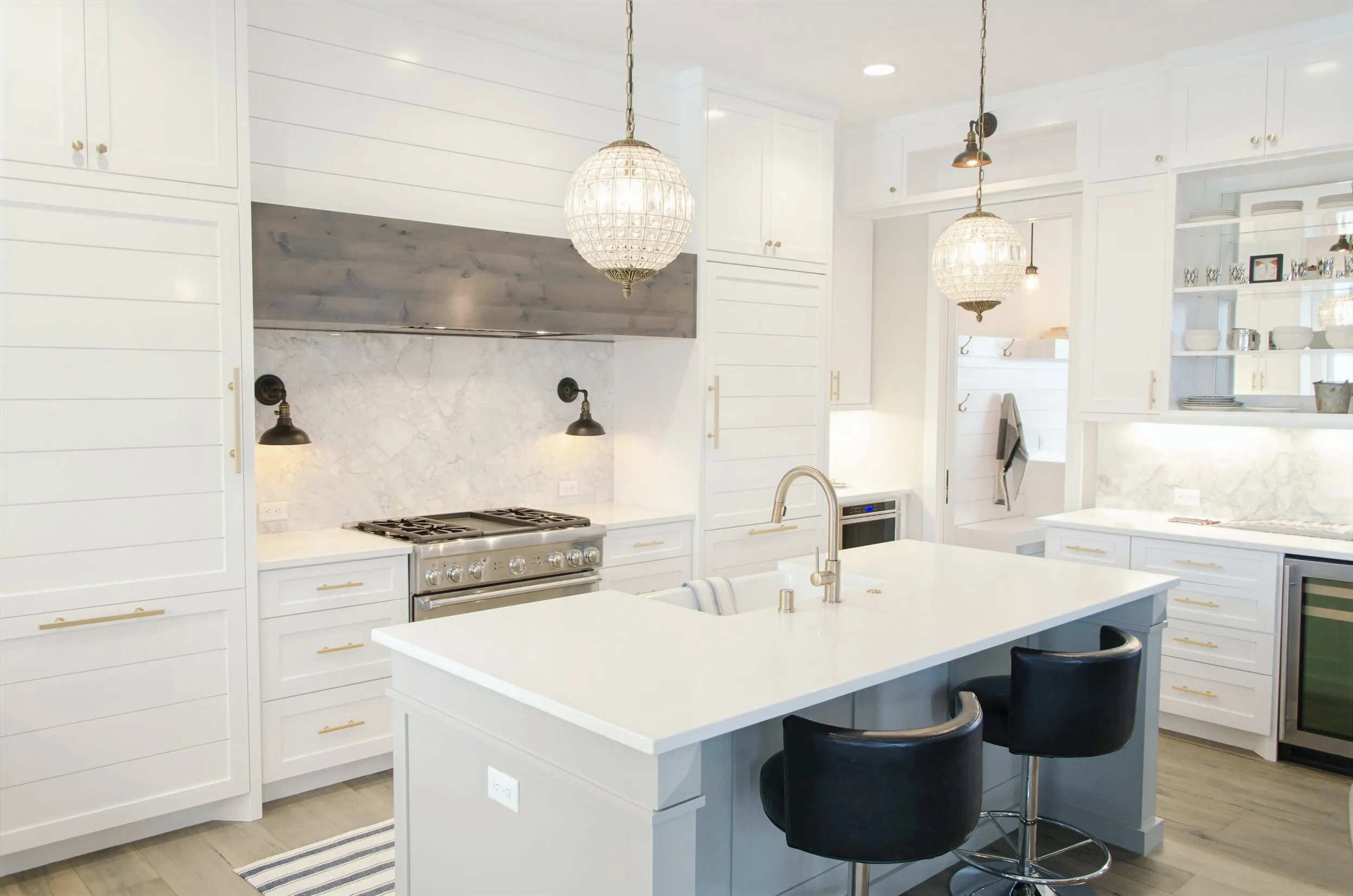 Finished white kitchen renovation with island bench